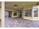 Covered patio is perfect for entertaining, showcasing a ceiling fan, recessed lighting, and smooth access to indoor living at 2626 Greenwillow Dr, Orlando, FL 32825