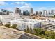 Overhead view of the building with a cityscape and a multi-story parking garage in the background at 304 E South St # 1023, Orlando, FL 32801