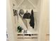 Mudroom with storage bench and coat rack, perfect for organizing outerwear at 3301 Bethpage Loop, Mount Dora, FL 32757