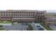 Exterior of Poinciana Medical Center featuring a parking lot and the main entrance at 332 Blue Lake Cir, Kissimmee, FL 34758