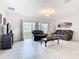 Living area with large windows providing ample natural light at 332 Blue Lake Cir, Kissimmee, FL 34758