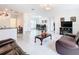 Bright, open living room featuring tile flooring and modern furnishings at 332 Blue Lake Cir, Kissimmee, FL 34758
