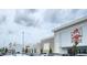 Retail strip center with a Crunch Fitness, restaurants, and other storefronts at 332 Blue Lake Cir, Kissimmee, FL 34758