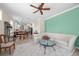 Bright living room featuring an open floor plan leading into the kitchen and dining area, perfect for entertaining at 336 Sunset Oaks Rd, Winter Garden, FL 34787