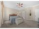 Inviting primary bedroom featuring a comfortable bed, stylish furnishings, and an ensuite bathroom with modern fixtures at 336 Sunset Oaks Rd, Winter Garden, FL 34787