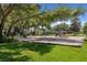 Well-maintained playground with slides and climbing equipment, set on a lush green lawn at 336 Sunset Oaks Rd, Winter Garden, FL 34787
