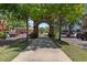 Inviting view under the 'Winter Garden' town arch, featuring well-maintained sidewalks and brick-paved surrounding area at 336 Sunset Oaks Rd, Winter Garden, FL 34787