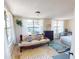 Bedroom featuring a couch, bed, and large windows at 340 Zelda Blvd, Daytona Beach, FL 32118