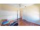 Spacious bedroom featuring hardwood floors and two closets at 340 Zelda Blvd, Daytona Beach, FL 32118