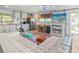 Cozy living area featuring a functional kitchenette and decorative fireplace, ideal for a relaxed lifestyle at 340 Zelda Blvd, Daytona Beach, FL 32118