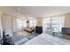 Bright living room with multiple windows and comfortable seating area at 340 Zelda Blvd, Daytona Beach, FL 32118