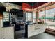 Charming coffee bar with brick accents, modern equipment, and large windows offering abundant natural light and street views at 397 Shoreview Sands Ave, Mascotte, FL 34753