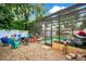 Enjoy the backyard with a screened pool, cozy seating area, and lush landscaping at 400 Shelby Ct, Apopka, FL 32712