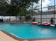 Sparkling backyard pool and spa area with ample lounging space and privacy at 400 Shelby Ct, Apopka, FL 32712
