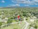 Expansive aerial view of neighborhood with lush greenery, highlighting the home's location at 401 Sanford Ave, Longwood, FL 32750