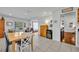 Dining area features tile flooring, natural light, and provides a view into the living areas at 401 Sanford Ave, Longwood, FL 32750