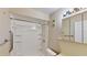 Bathroom with shower-tub combo, updated vanity and mirror at 408 E Orlando Ave # 2A, Ocoee, FL 34761