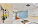 Kitchen with a view of an open-concept floor plan including hardwood floors and lots of natural light at 408 E Orlando Ave # 2A, Ocoee, FL 34761