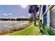 Enjoy picturesque water views and lush landscaping, creating a tranquil atmosphere near the condo at 408 E Orlando Ave # 2A, Ocoee, FL 34761