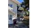 Exterior shot of a light green two-story building with visible unit number at 415 N Fern Creek Ave, Orlando, FL 32803