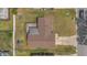 Aerial view of home featuring large, fenced backyard, covered patio, and a long driveway at 4636 Mesa Verde Dr, St Cloud, FL 34769