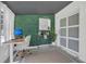 Stylish office features a modern desk, sliding door and a distinctive moss wall at 4636 Mesa Verde Dr, St Cloud, FL 34769