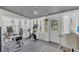 Inviting home office featuring natural light from surrounding windows and flexible office space at 4636 Mesa Verde Dr, St Cloud, FL 34769