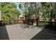 The spacious wooden back deck offers ample room for outdoor entertaining and relaxing at 506 S Hyer Ave, Orlando, FL 32801