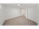 Bright bedroom features neutral carpeting and closet, offering a cozy and functional space at 506 S Hyer Ave, Orlando, FL 32801