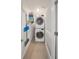 Laundry closet with stacked washer and dryer at 506 S Hyer Ave, Orlando, FL 32801