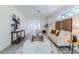 Spacious living room featuring modern decor and a seamless flow to other areas in the home at 506 S Hyer Ave, Orlando, FL 32801