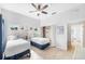 Bright bedroom with two twin beds, light gray walls, and seaside themed decorations at 509 New Providence, Davenport, FL 33897