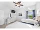 Bright bedroom with two twin beds, light gray walls, and seaside themed decorations at 509 New Providence, Davenport, FL 33897