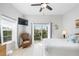 Bedroom features deck access, neutral decor, and bright, natural light at 509 New Providence, Davenport, FL 33897