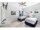 Bright bedroom with two twin beds, light gray walls, and seaside themed decorations at 509 New Providence, Davenport, FL 33897