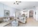 Bright living room flows into the dining area and kitchen, great for entertaining at 509 New Providence, Davenport, FL 33897