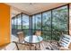 Enclosed patio area with beautiful green views, a ceiling fan, and outdoor seating at 509 New Providence, Davenport, FL 33897