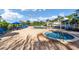 Resort pool with lounge seating and umbrellas at 509 New Providence, Davenport, FL 33897