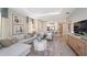 Bright living room boasts an open floorplan, recessed lighting, and calming neutral color palette at 5337 Spoonflower Ct, St Cloud, FL 34771