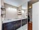 Bright bathroom with double sink vanity, granite countertop, walk-in shower and closet at 6 Escondido Cir # 64, Altamonte Springs, FL 32701