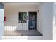 Charming condo entrance featuring a welcoming door, a decorative door hanger, and a bright exterior at 6 Escondido Cir # 64, Altamonte Springs, FL 32701