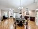 Inviting living area showcasing a fireplace, wood floors, and ample natural light at 6 Escondido Cir # 64, Altamonte Springs, FL 32701