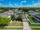 Charming single-Gathering home with a well-manicured lawn, mature trees, and a two-car garage at 610 Carey Way, Orlando, FL 32825