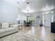 Open concept living space with dining area and front door at 610 Carey Way, Orlando, FL 32825