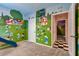 Themed bedroom with playful Smurf murals, mushroom bunk bed, and a fun slide, perfect for  at 7618 Oakmoss Loop, Davenport, FL 33837