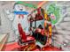 A game room featuring an arcade driving game and large murals at 7618 Oakmoss Loop, Davenport, FL 33837