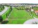 Community soccer field with manicured lawn, ready for a game at 7618 Oakmoss Loop, Davenport, FL 33837