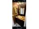 Bathroom featuring granite countertops, modern fixtures, and a mirror with vanity lighting at 7629 Chapelhill Dr, Orlando, FL 32819