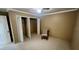 Bedroom with a spacious closet, ceiling fan, and natural light creating a comfortable and inviting atmosphere at 7629 Chapelhill Dr, Orlando, FL 32819
