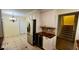 Kitchen and breakfast nook with stainless steel refrigerator and tile floors at 7629 Chapelhill Dr, Orlando, FL 32819